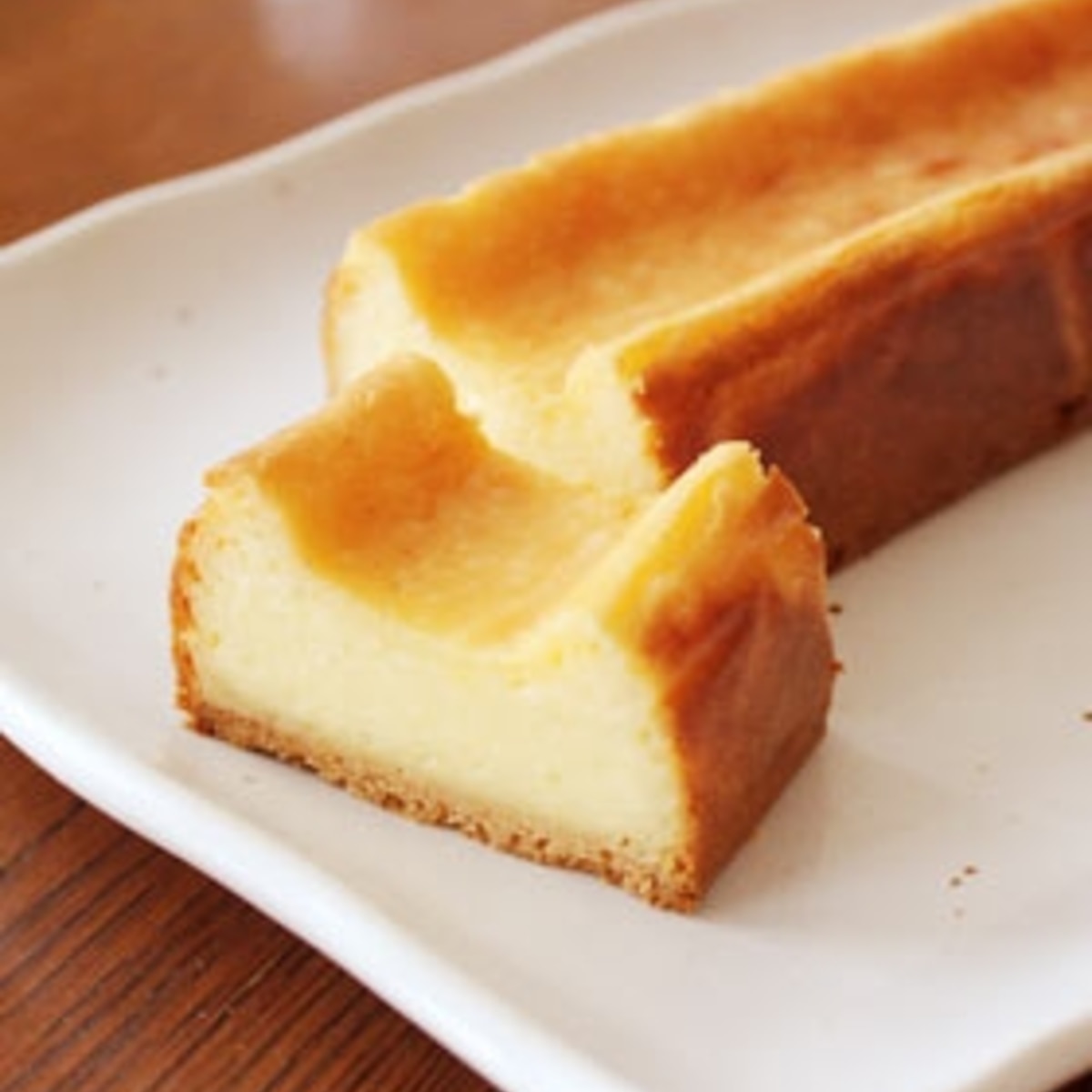 ベイクドチーズケーキ 0 5斤パン型使用 レシピ 作り方 By おだマキ ショコラスキー 楽天レシピ